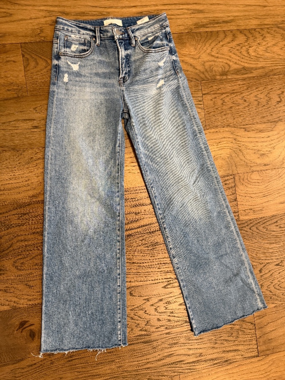 Risen wide leg distressed jeans size 7 with raw hem